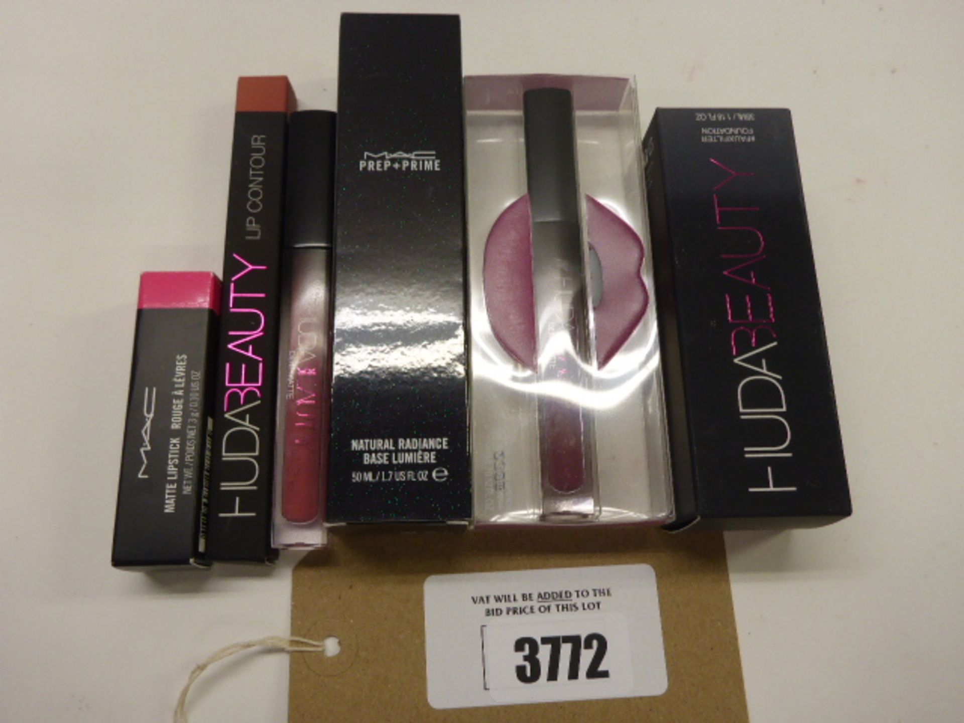 Selection of MAC and Huda Beauty cosmetics