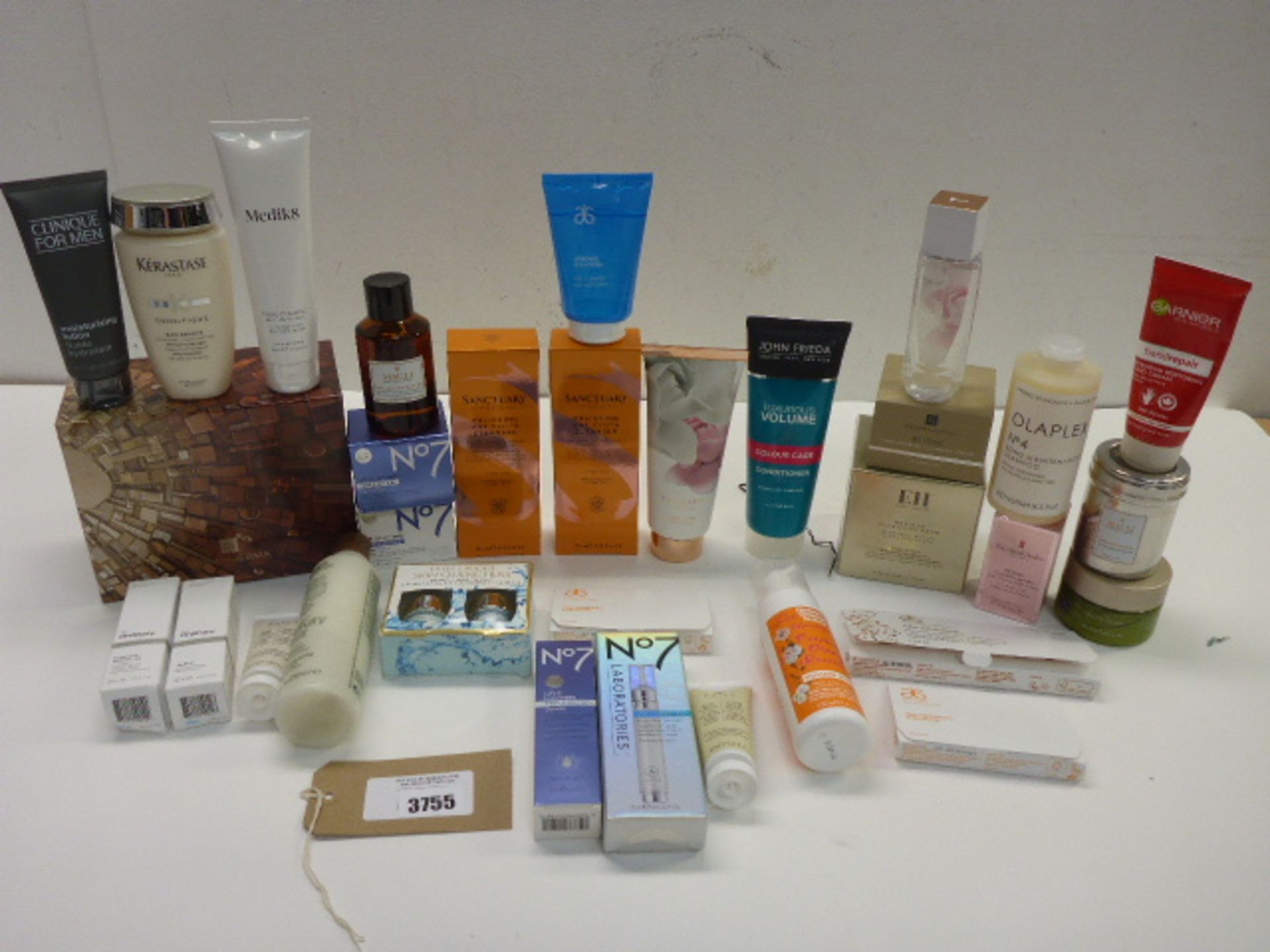 Selection of branded toiletries including Arbonne, Clinique, Emma Hardie, Elizabeth Arden, Estee