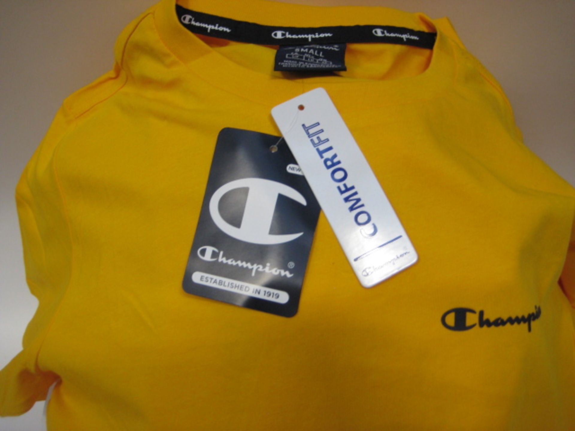 Box containing 65 Champion yellow T-shirts sizes predominately small - Image 3 of 3