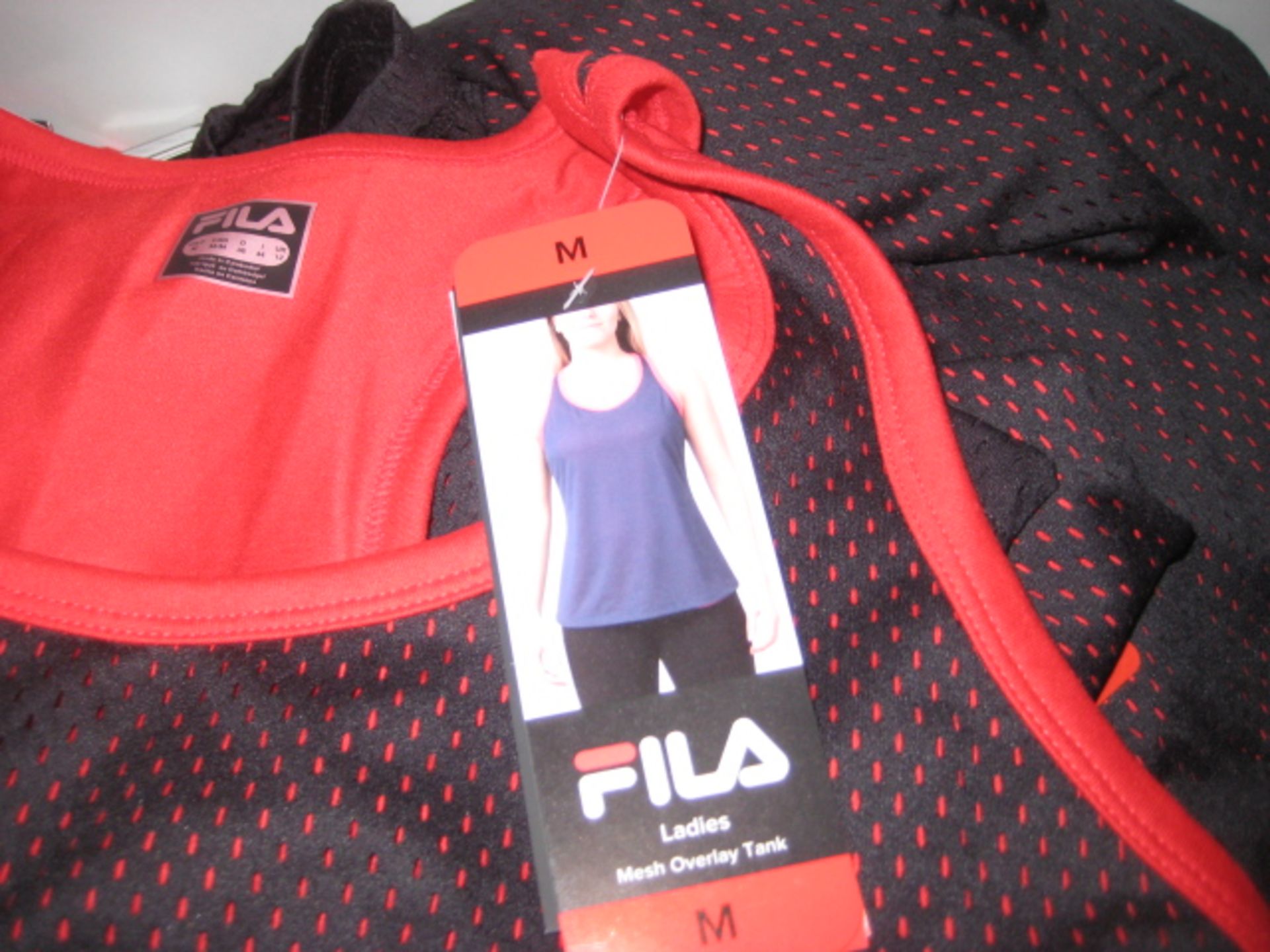 Bag of 24 Fila ladies mesh overlay tank tops sizes S-M - Image 2 of 2