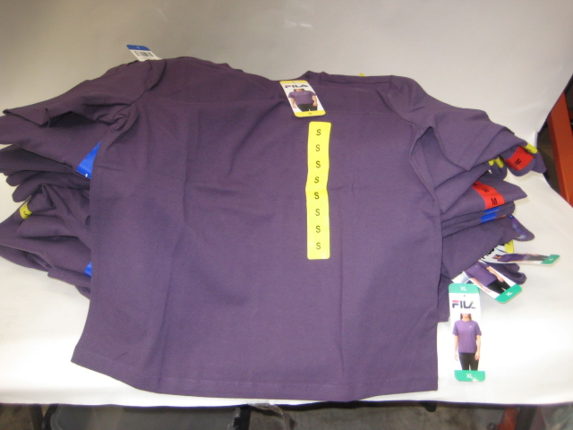 Bag containing ladies Fila purple T-shirts - various sizes S-XL