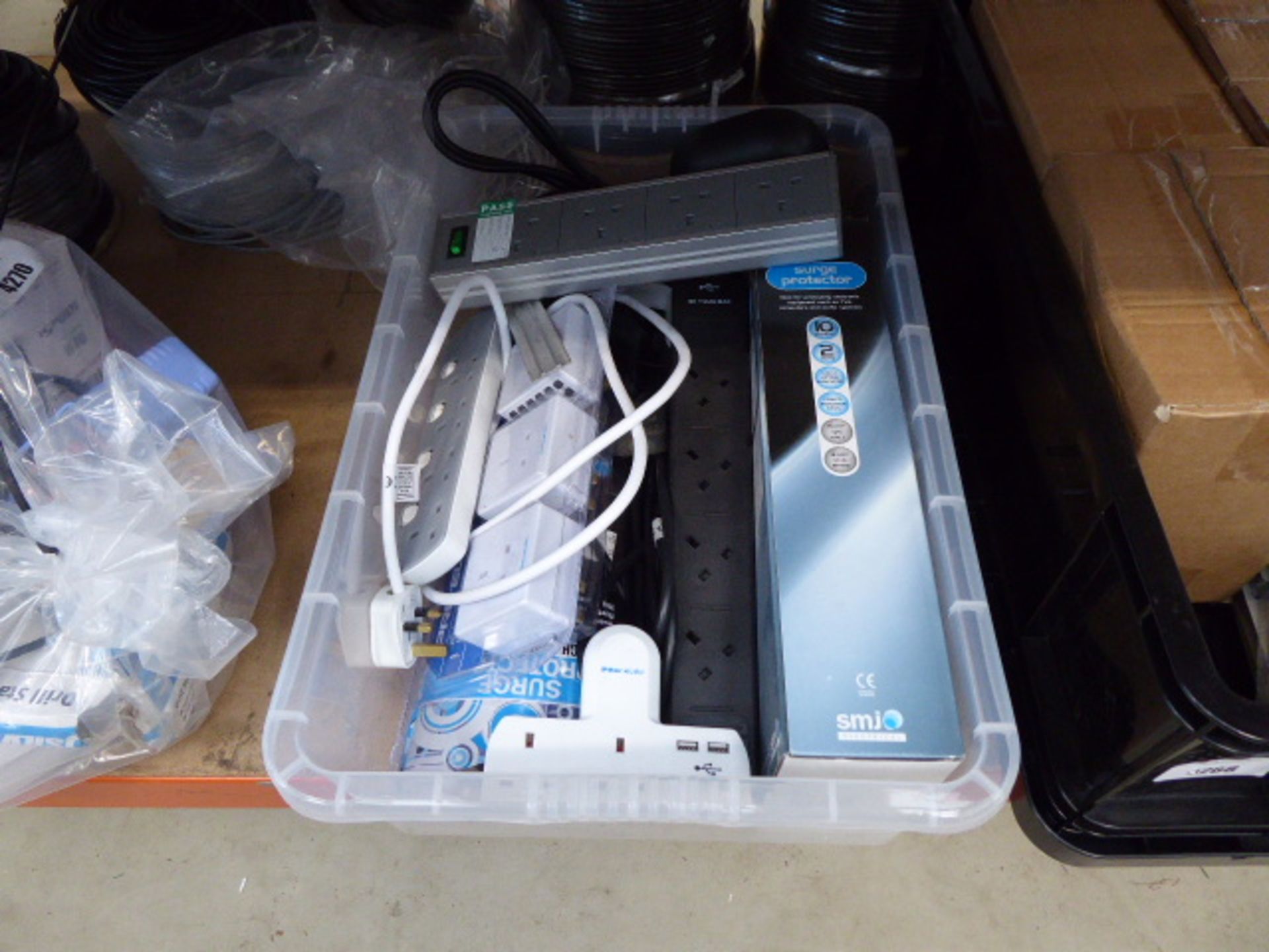 Plastic crate containing approximately 5 socket bars and surgical protectors