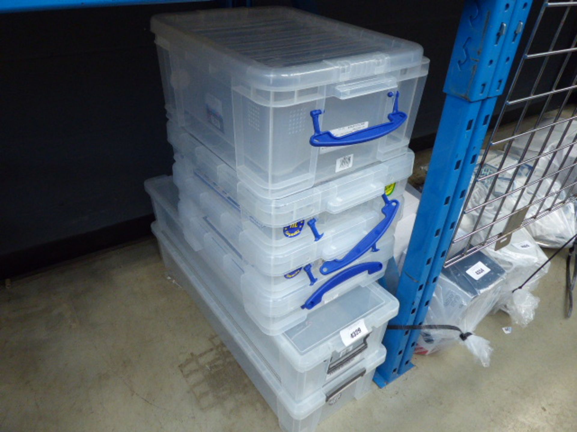 5 assorted storage boxes