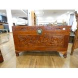 A late 20th century Oriental camphor-type trunk decorated with sailing vessels, w. 101 cm