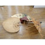 A large late 20th century Oriental fan, l. 76 cm, two parasols and a canework fan (4)