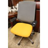 vitra Meda Pro orange and grey swivel office armchair