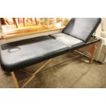 Black folding massage bed