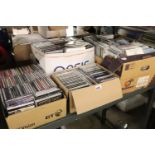 4 boxes of various CDs