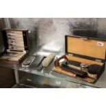 Shelf of mixed collectibles incl. shaving kit, cased Parker pen and EPNS cutlery set