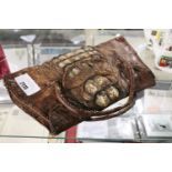 Crocodile skin style handbag