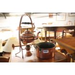 Copper spirit kettle on stand and small twin handled copper pan