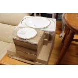 Collection of packaged Wedgwood Plato Gold ceramics incl. 2 serving platters, 7 dinner plates and 10