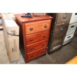 Red stained chest of 4 drawers