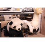 2 coin operated ride on animals (panda and other animal)