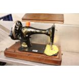 Wooden cased Singer sewing machine