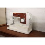 Boxed Singer 6104 sewing machine
