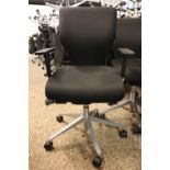 10 black upholstered swivel office armchairs, manufactured by orangebox, model X10-MBA