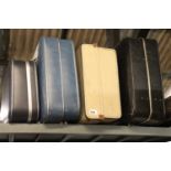 (2256) 4 vintage suitcases