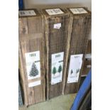 (1018) 3 boxed Christmas trees