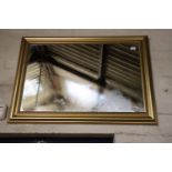 Large gilt framed rectangular wall mirror