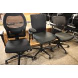 3 various black swivel office armchairs