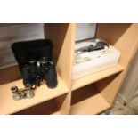 150-900x microscope with cased pair of binoculars and set of opera glasses