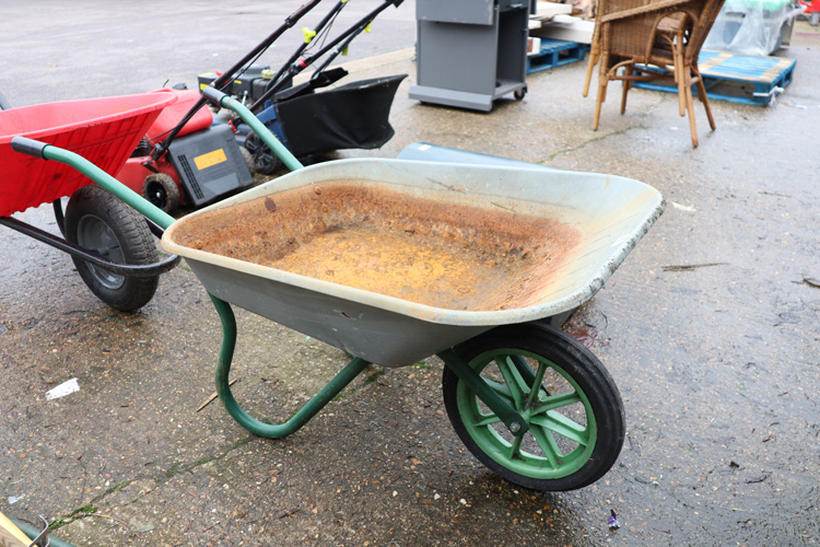 Green framed metal wheelbarrow