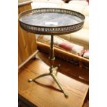 Brass wine table with marble effect surface on single pedestal 3 star base