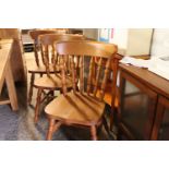 Set of 8 pine spindle back dining chairs