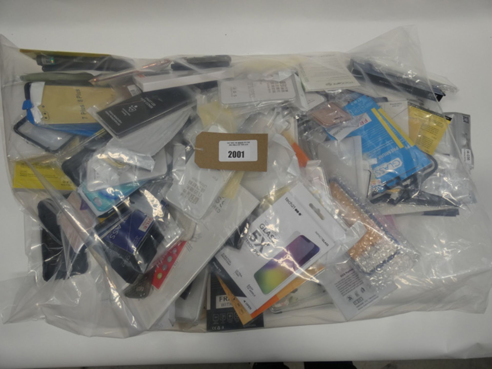 Bag containing quantity of mobile phone cases and covers