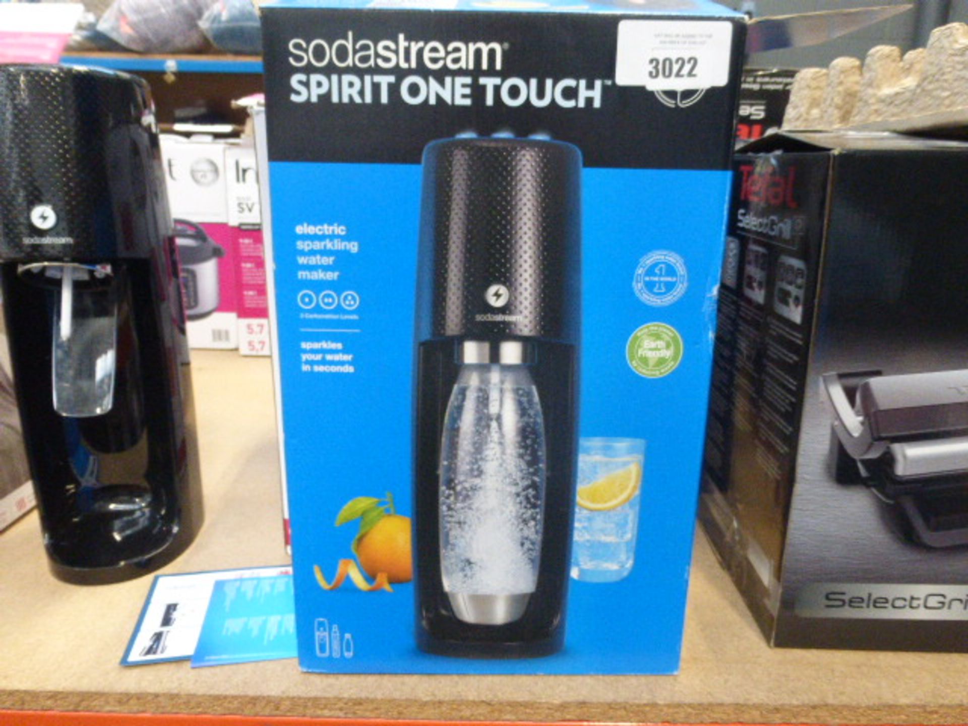 A boxed Soda Stream electric sparkling water maker