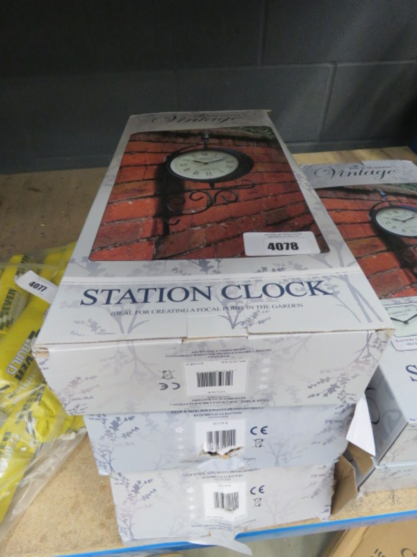 3 boxed station clocks