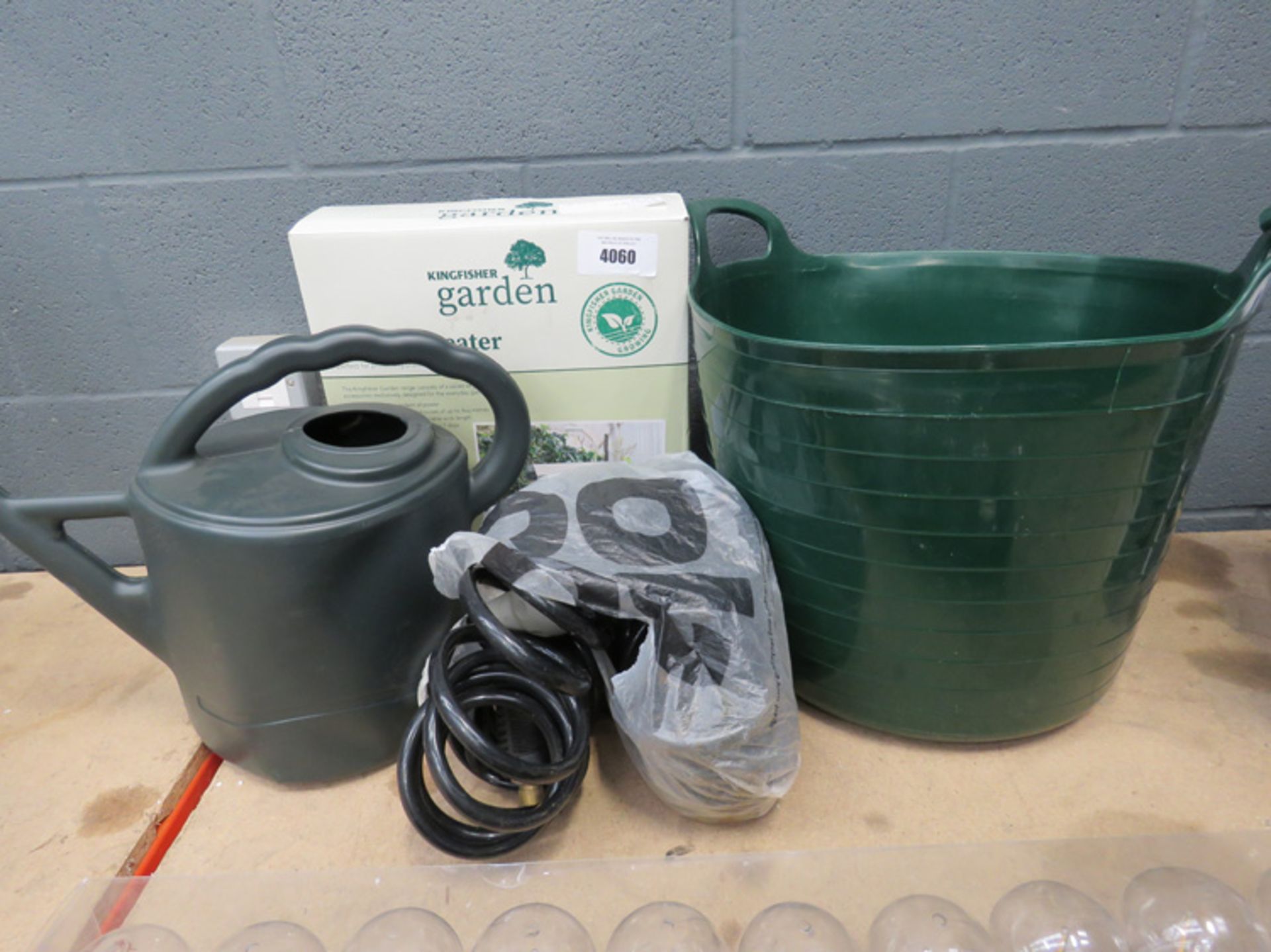 Watering can, green trug, paraffin heater and a Suzy hose