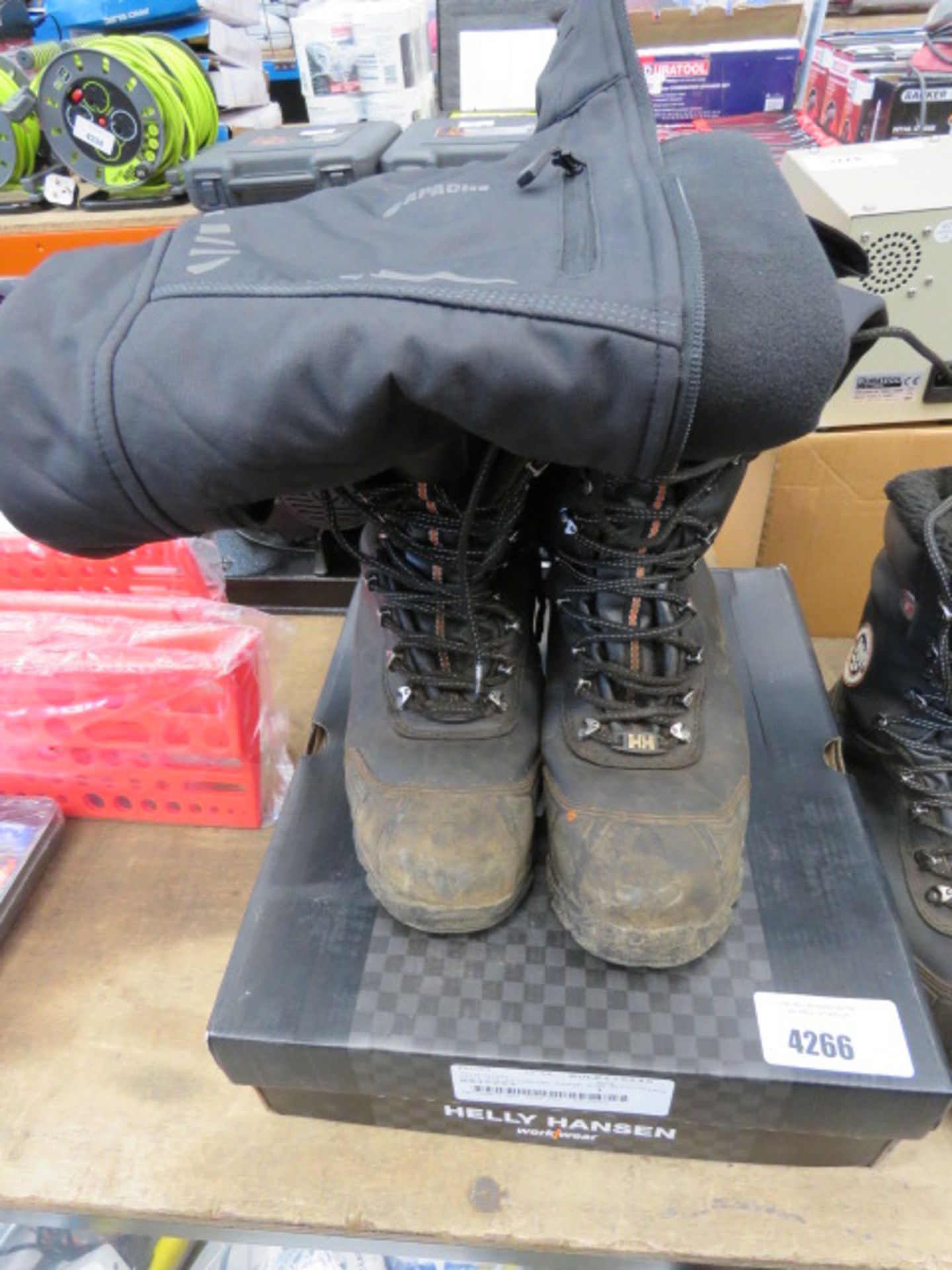 Pair of Helly Hansen used work boots, size 9, and Apache jacket