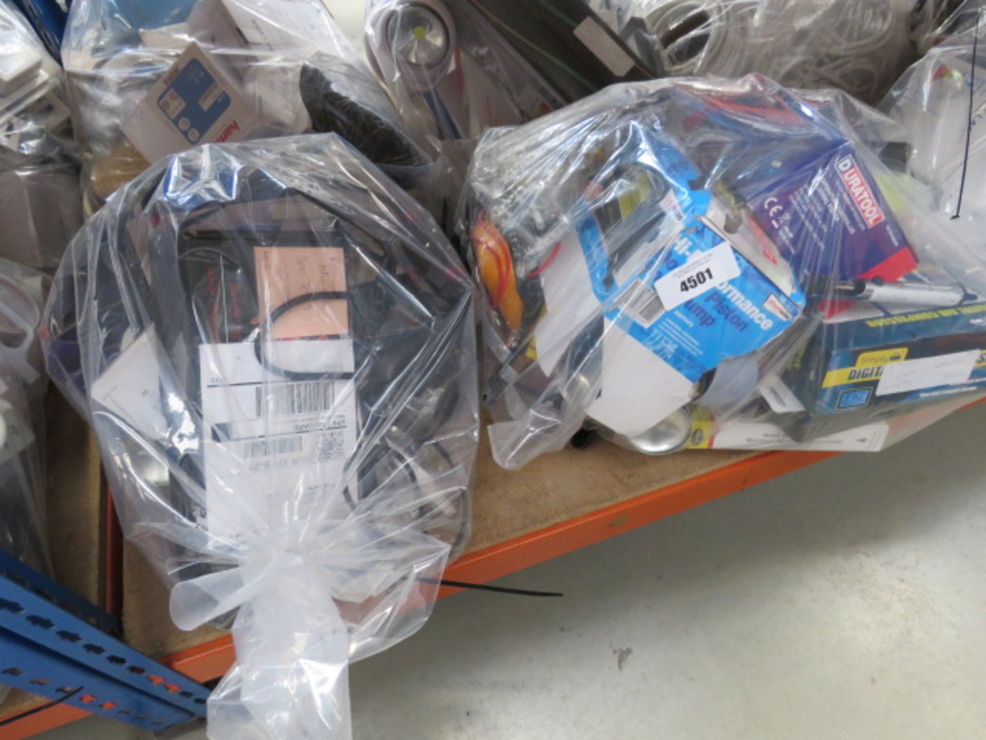 2 bags containing door piston pump, soldering stations, air compressors, cables, extension leads,
