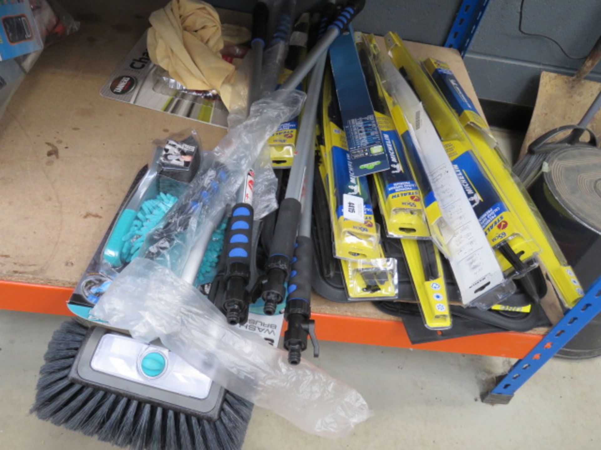 ¼ underbay of car related items incl. wiper blade, wash brushes, chamois leathers etc.