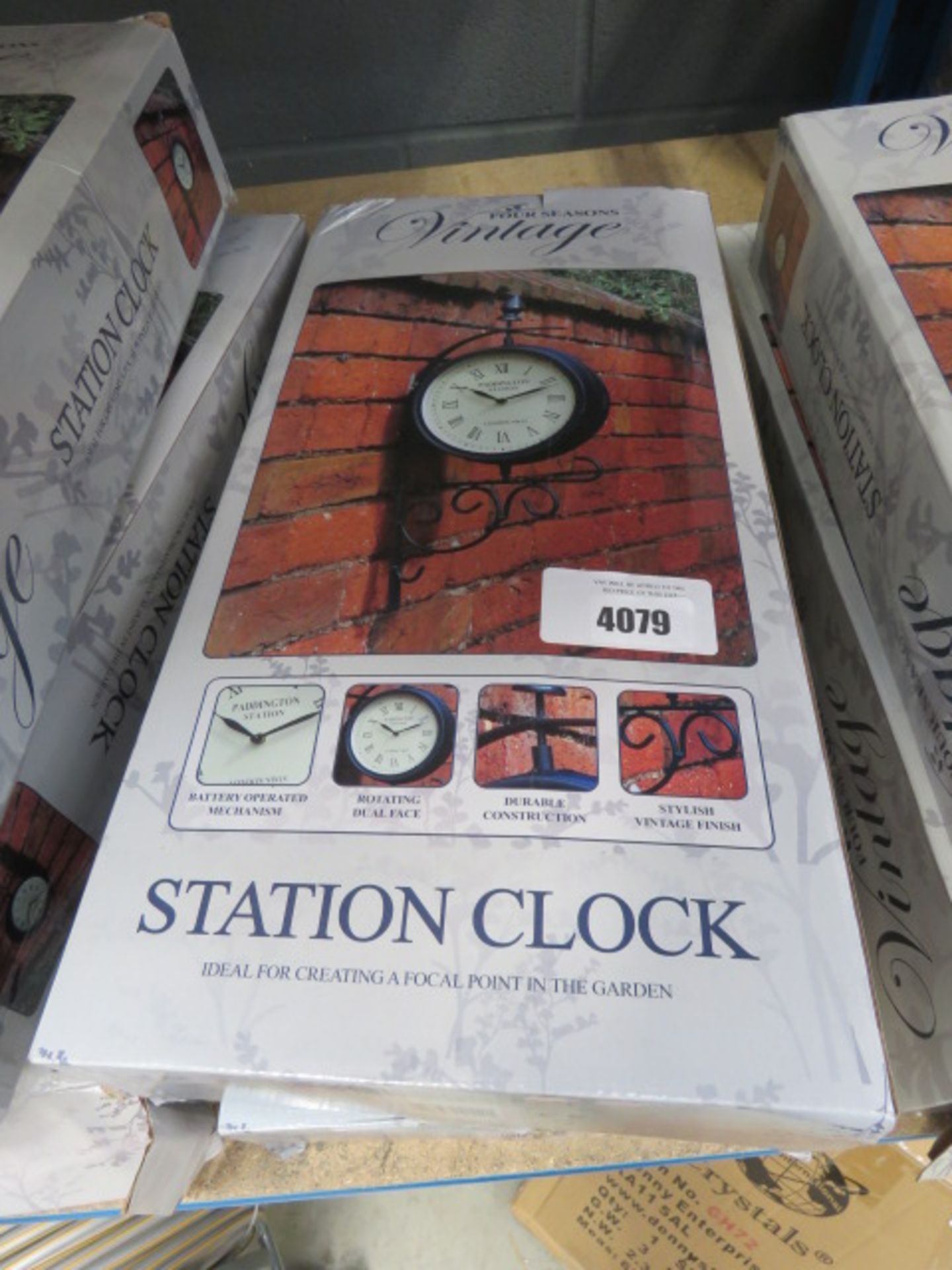 2 boxed station clocks