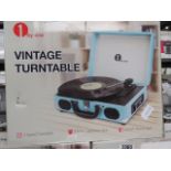 Boxed One by One vintage turntable