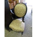 Floral upholstered bedroom chair with black wooden frame