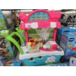 One boxed and one unboxed Leapfrog Scoop and Learn Ice Cream carts
