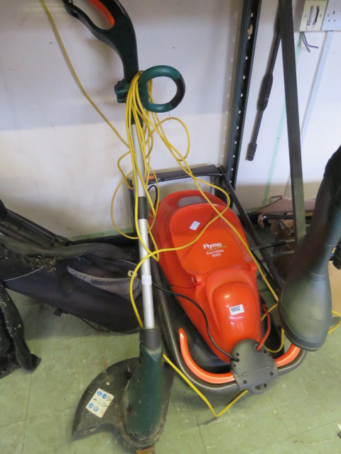 Electric Flymo lawnmower with an electric strimmer