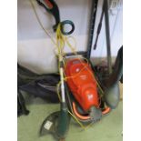 Electric Flymo lawnmower with an electric strimmer