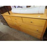 Modern rubberwood sideboard with 4 drawers and 3 smaller drawers over