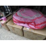 2 boxes containing pink love heart beanbags together with a box of pink Papa Amento jewellery