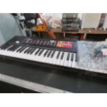 Yamaha electronic keyboard with charger