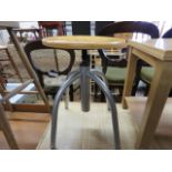 Height adjustable stool on metal 4 star support
