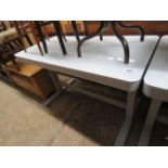 Glass topped metal framed height adjustable desk