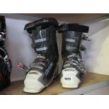 Pair of Nordica ski boots in black and white