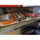 Lower shelf containing Lima and other model railway components including track, goods wagons, etc