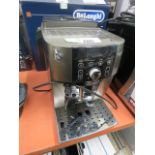 Unboxed Delonghi Magnifica smart cappuccino machine